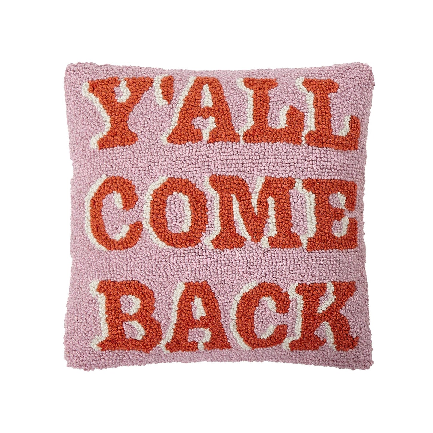 Cool western style pillow with fun phrase “y’all come back now” in orange caps against soft pink fabric