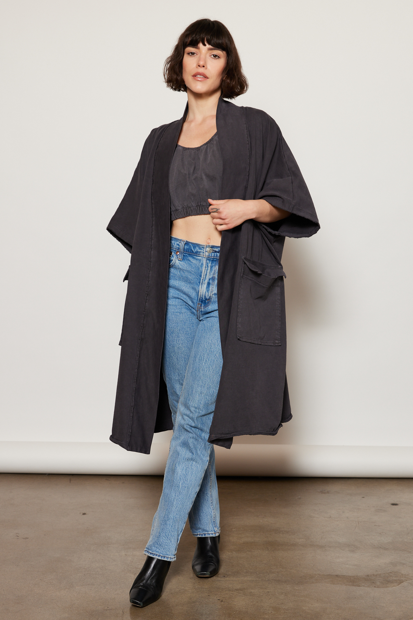 Ash black oversized, knee-length boho jacket made from cotton with large convenient outer pockets.