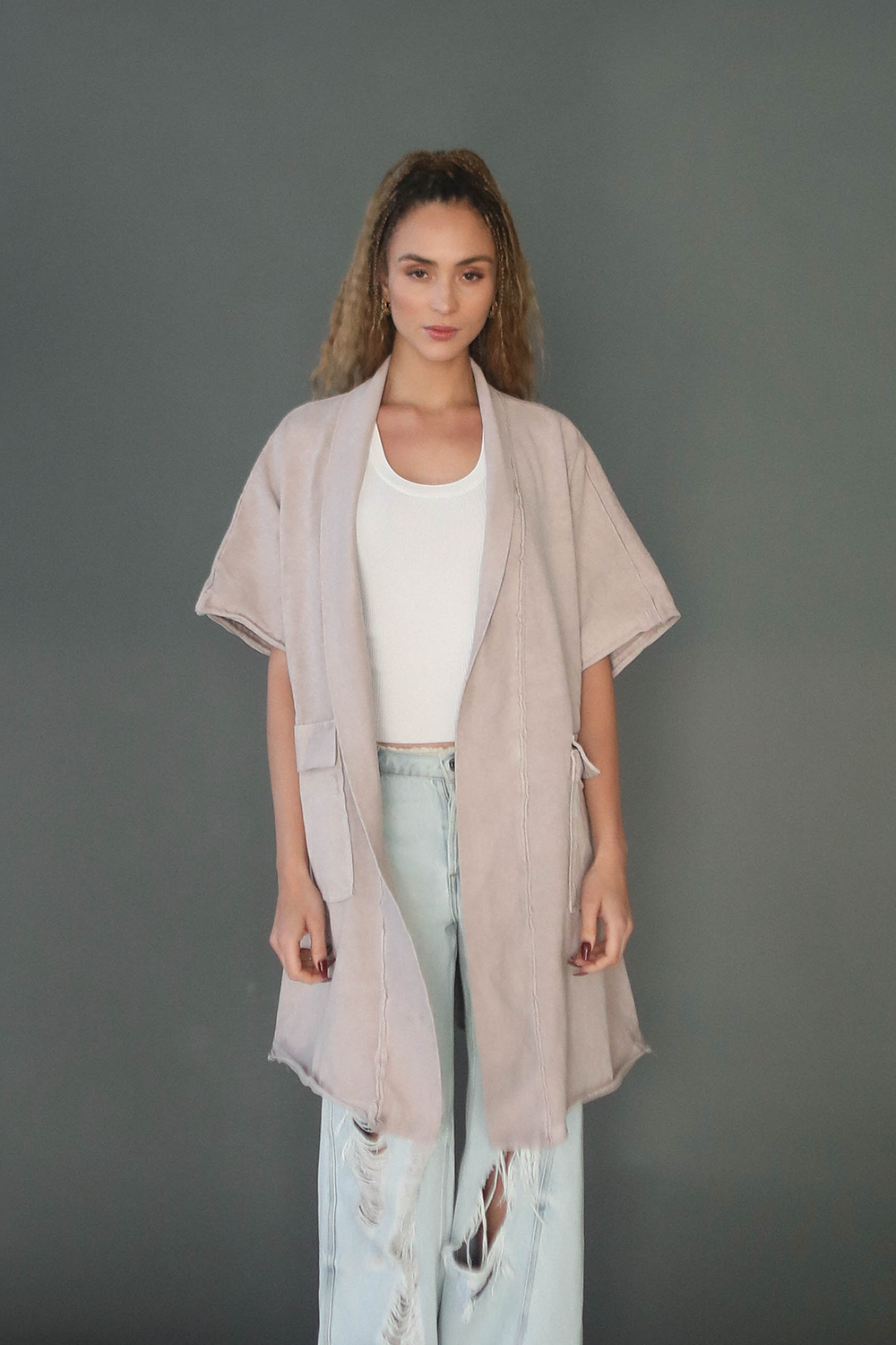 Flowy, relaxed cotton casual jacket with oversized sleeves, large square pockets and flexible styling options in soft lavender color.