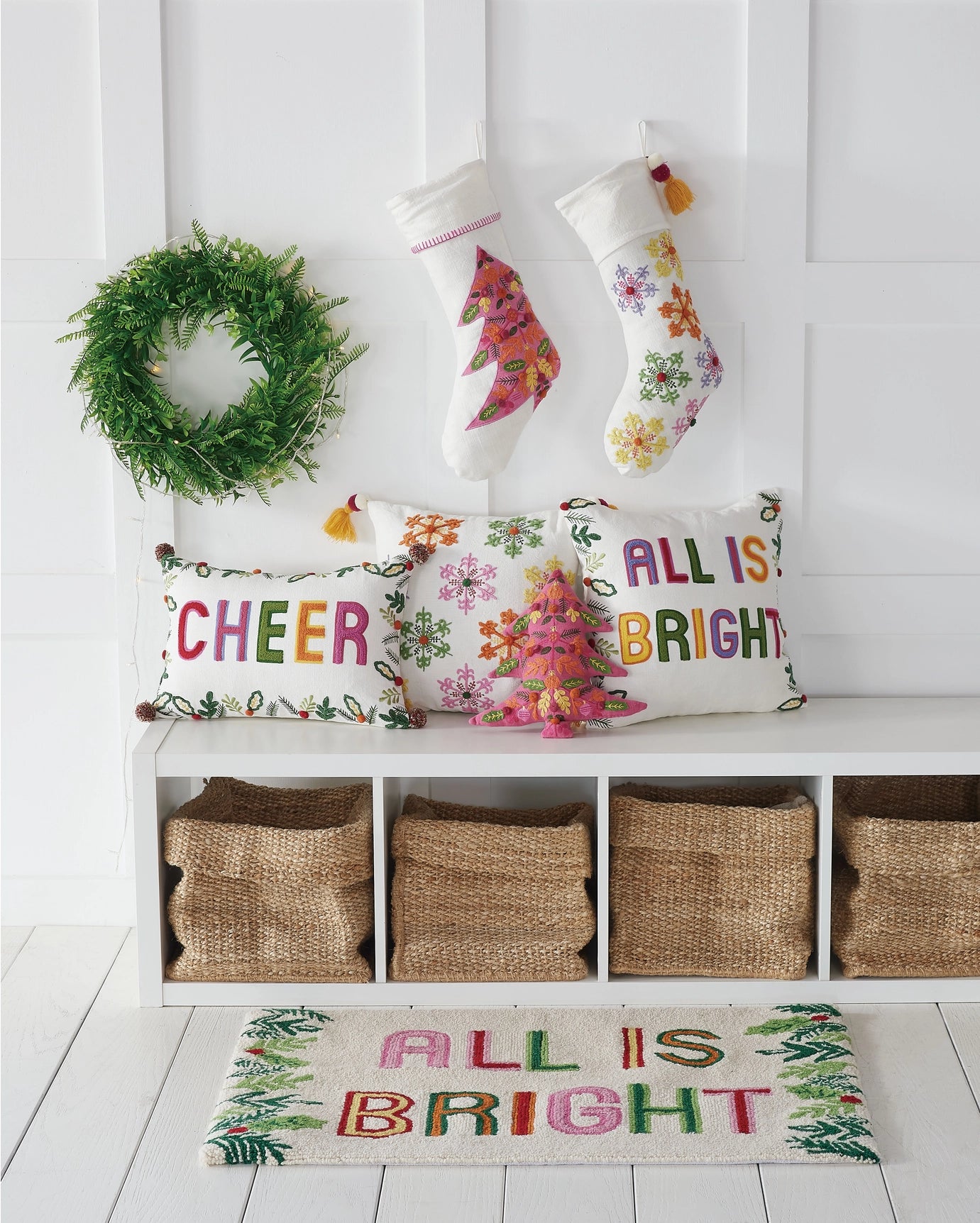 Holiday decor with coordinating Christmas tree and snowflake stockings and pillow