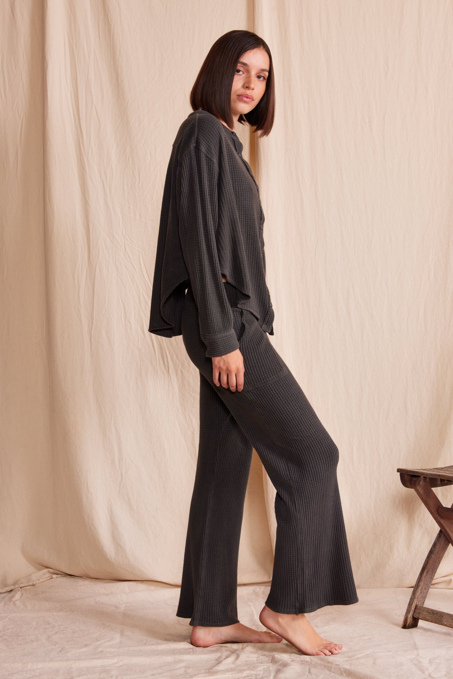 Comfy 3/4 relaxed fit pants in vintage ash black color featuring waffle print.