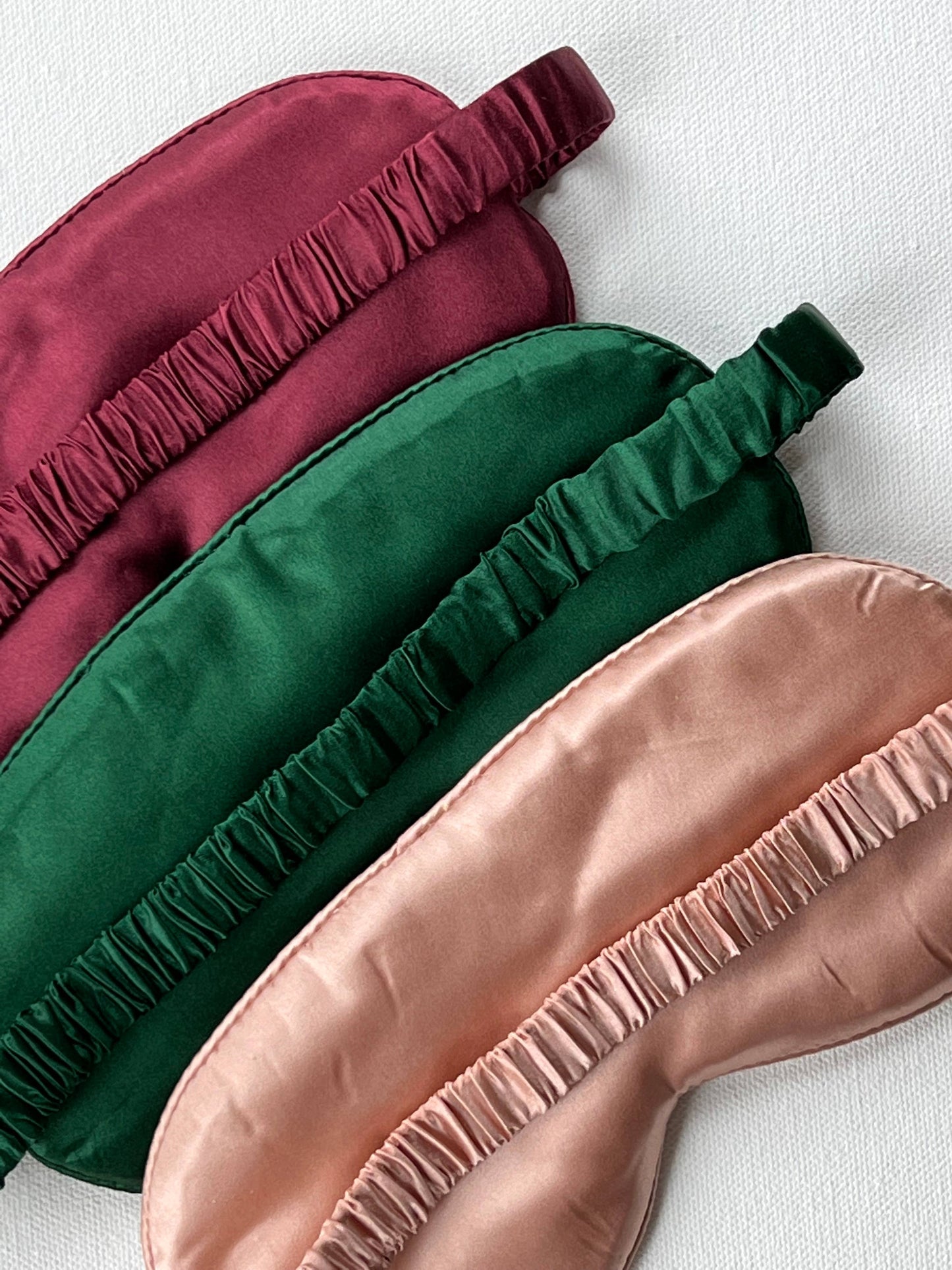 Sleek collection of silk eye masks with Hamsa embroidery