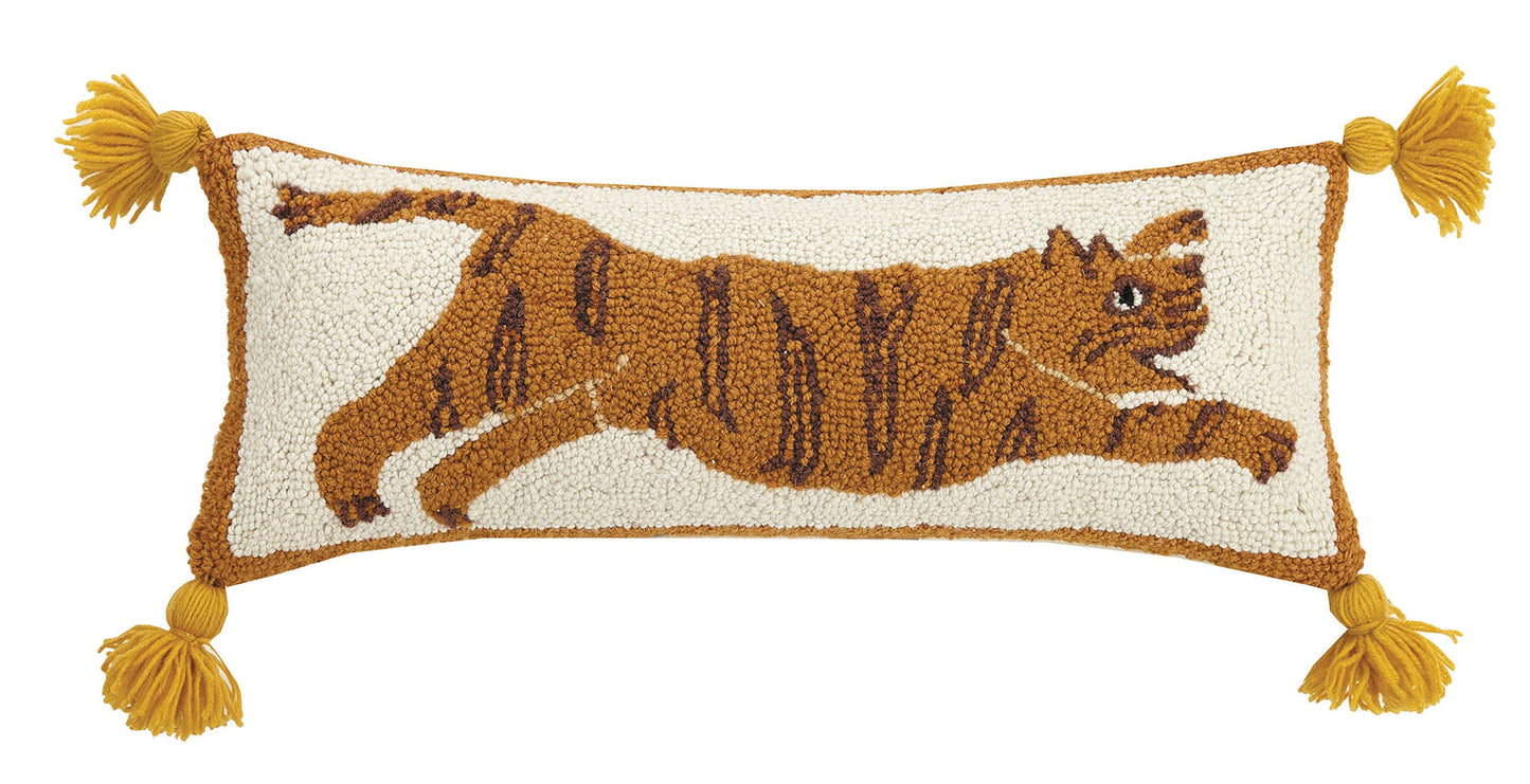 Intriguing tiger design across cream wool pillow with golden tassels