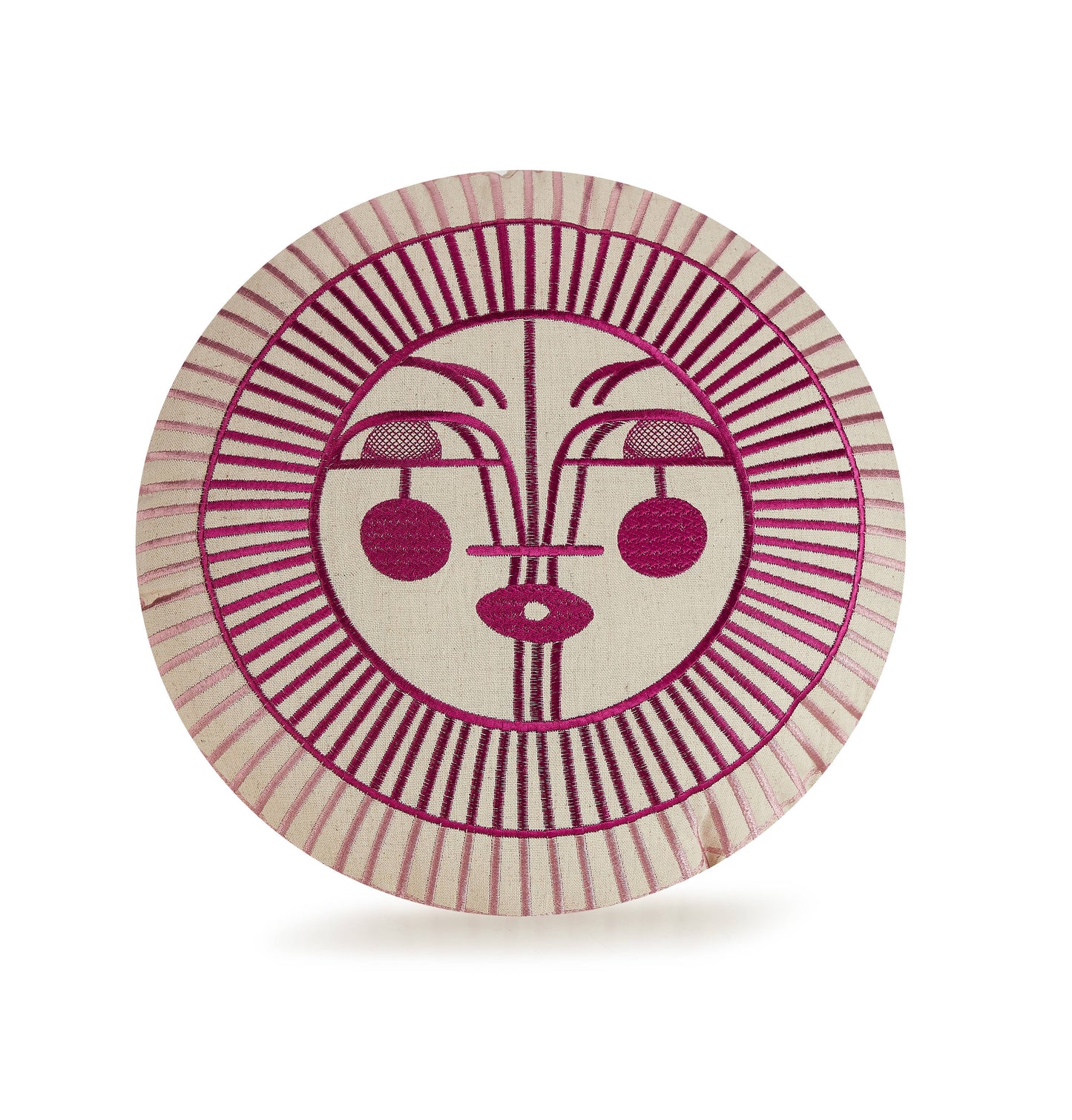 Boho chic throw pillow with embroidered sun design featuring crimson and pink colored rays and soft brown center