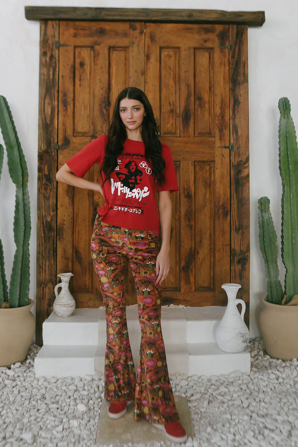 Trippy, velvety bell bottom style pants with groovy brown, pink, and red mushroom and flowery print.