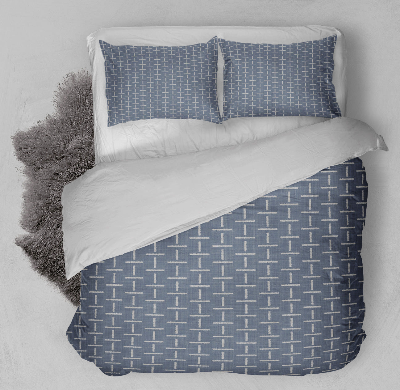 Fresh bed featuring printed chambray comforter set with cross motif design.