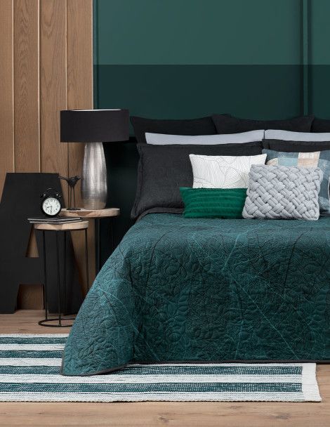 Traditional bedroom featuring rich Emerald Emersion quilt with 3D technology and flora design.