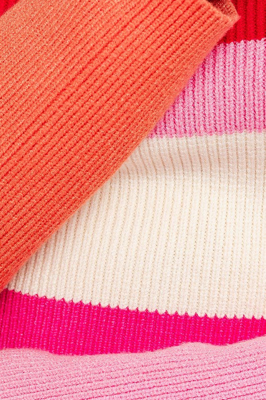 Close up of bright color block pattern on ribbed, cropped sweater