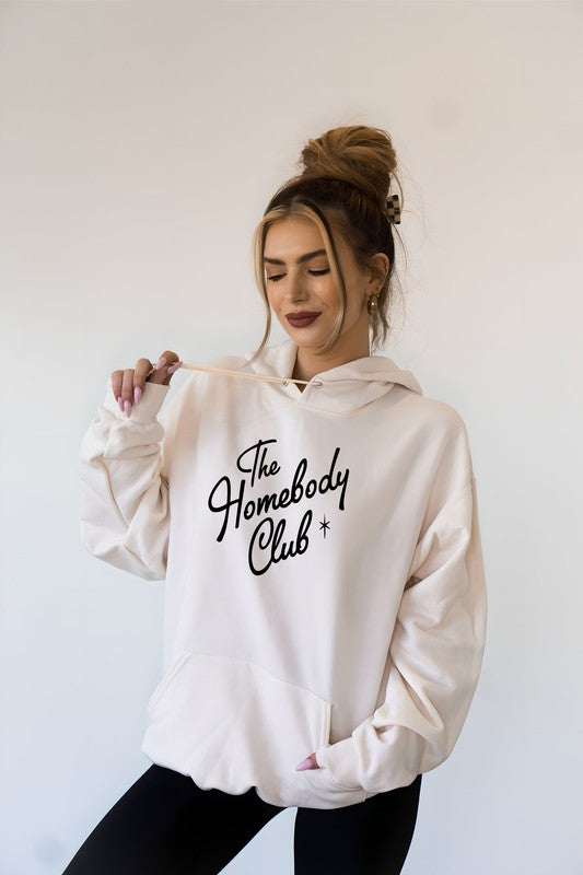 The Homebody Club hoodie in cream with black font and graphic star