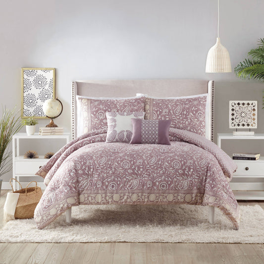 Lavender comforter with intricate floral and paisley pattern throughout 