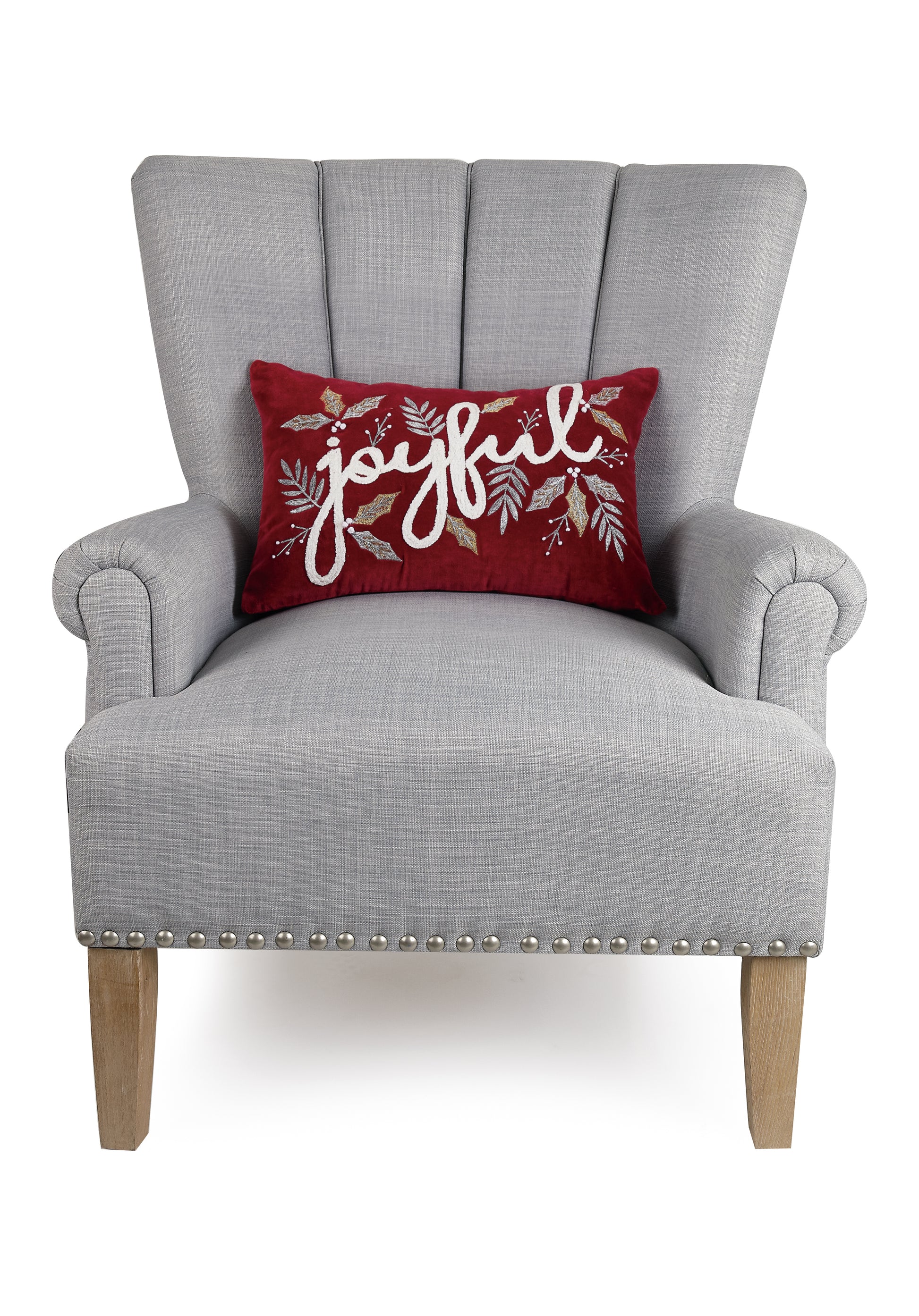 Complementary sitting chair displaying burgundy “joyful” holiday pillow