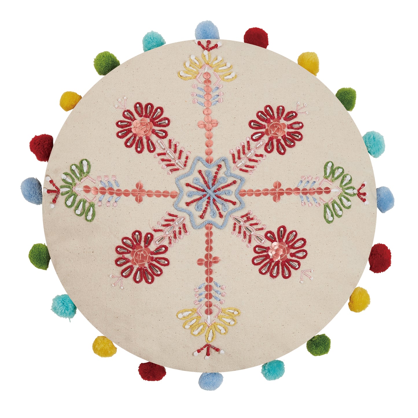 Beige circular pillow with bright, multicolored pom pom edges and embroidered boho style snowflake design in the center