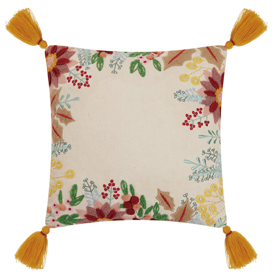 Orange tassel pillow with multicolored fall floral embroidered and hooked design