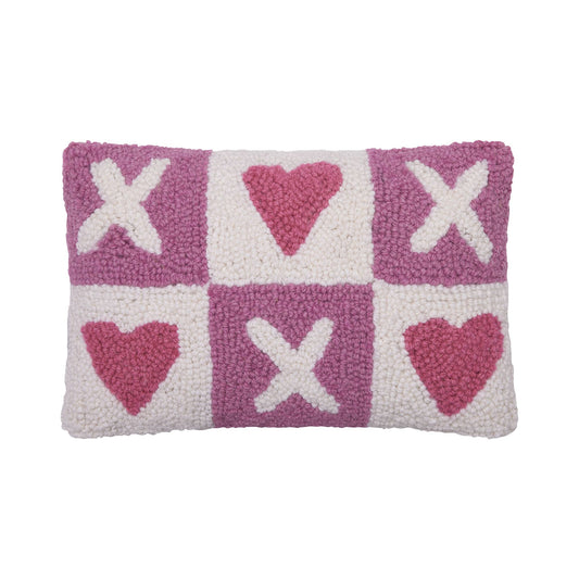 Purple and white checkered wool pillow featuring a friendly game of “x’s” and pink hearts