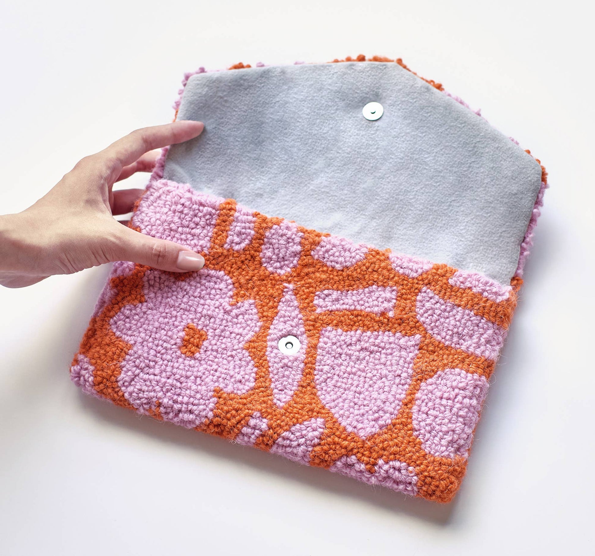 Floral pop art clutch with pink and orange abstract design
