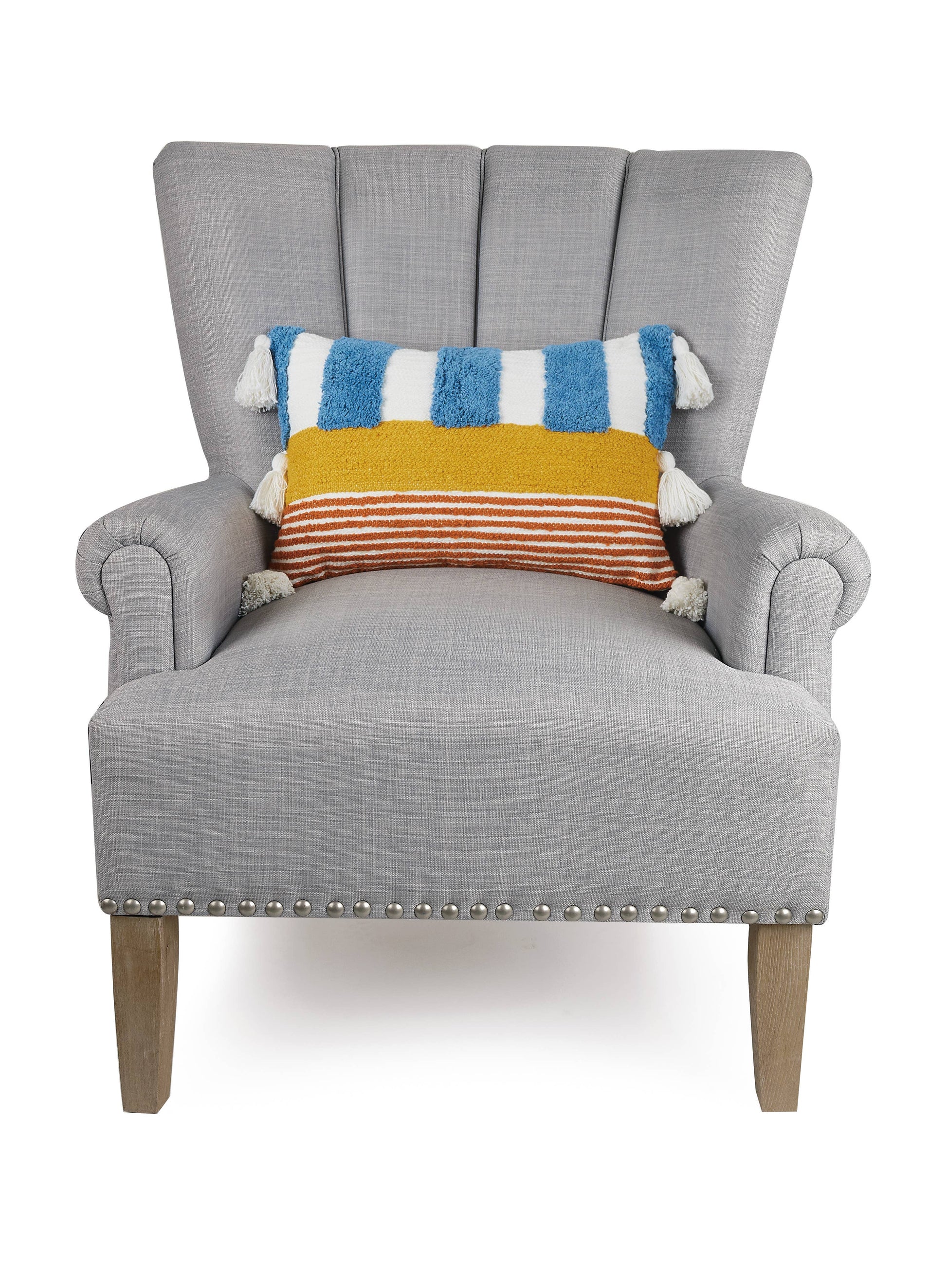 Color block pillow (red, white, blue, yellow) with circus-like display and fun tassels