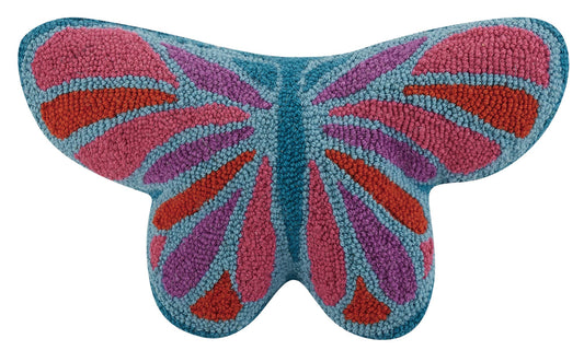 Multi-colored wool hooked butterfly shaped pillow with blue base and bright pink and red accents