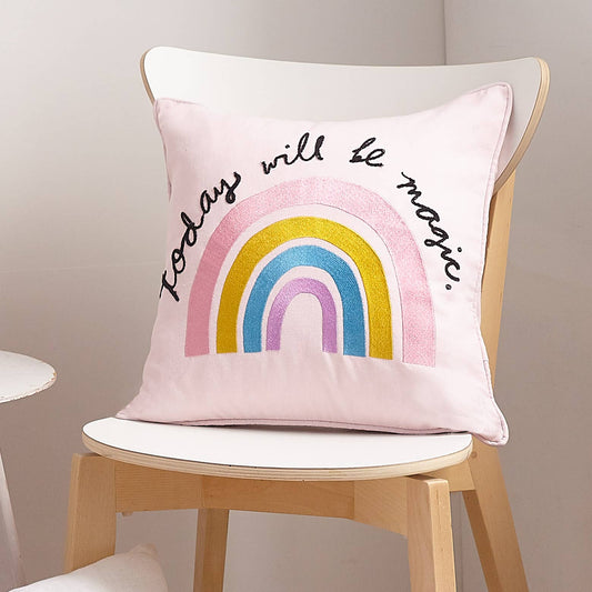 Inspiring kids and youth pillow in pink adorned with message “today will be magic.”
