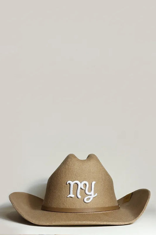 Unisex wool folder brim cowboy hat in beautiful chocolate brown featuring “NY” in white cursive letters finished with a classy brown faux leather trim.