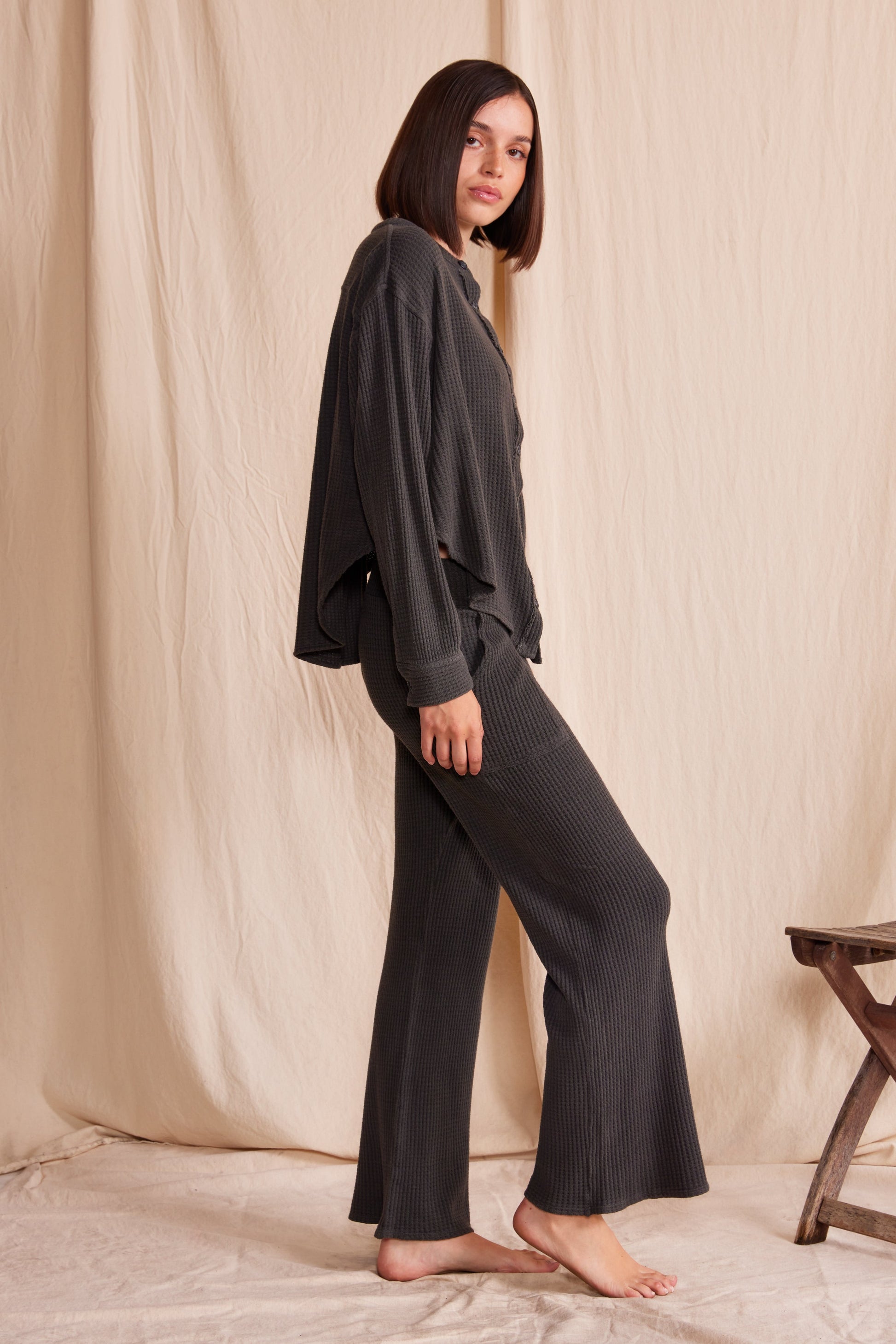 Comfy 3/4 relaxed fit pants in vintage ash black color featuring waffle print.