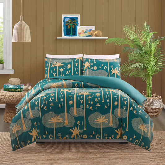 Cosmic Desert Duvet with gold palm tree motifs across an emerald spread