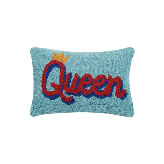 Blue wool hooked pillow with “Queen“ displayed in red letters with golden crown