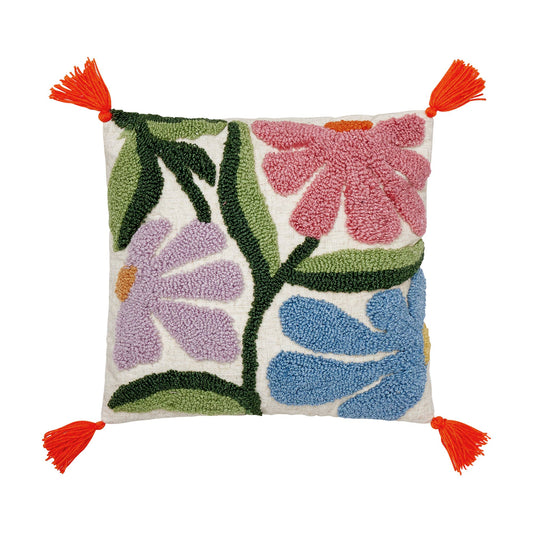 Throw pillow featuring classic flower trio with detailed wavy wool hooked design and bright orange tassels