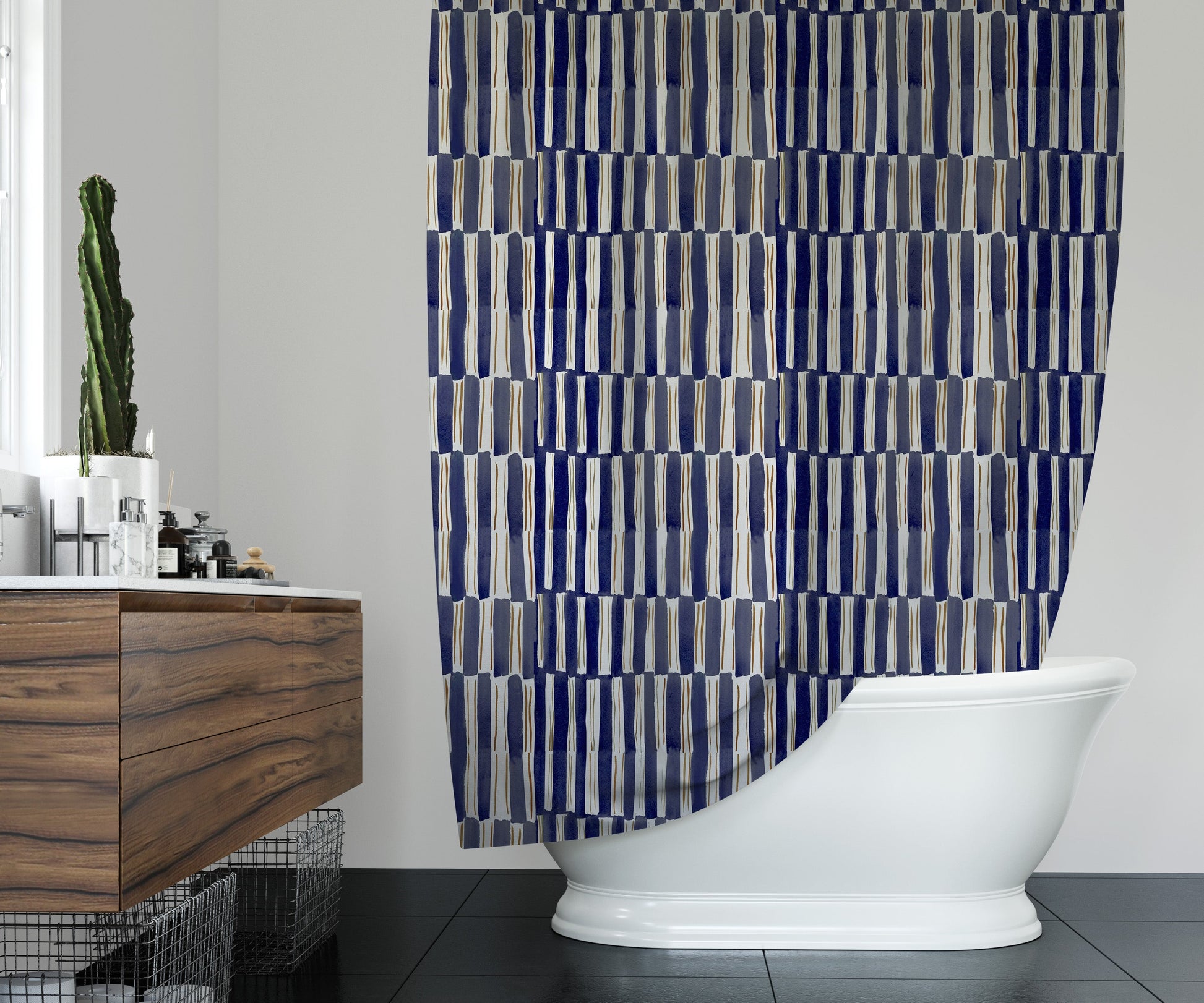 Clean bathroom featuring washable shower curtain with staggered blue and white striped design.