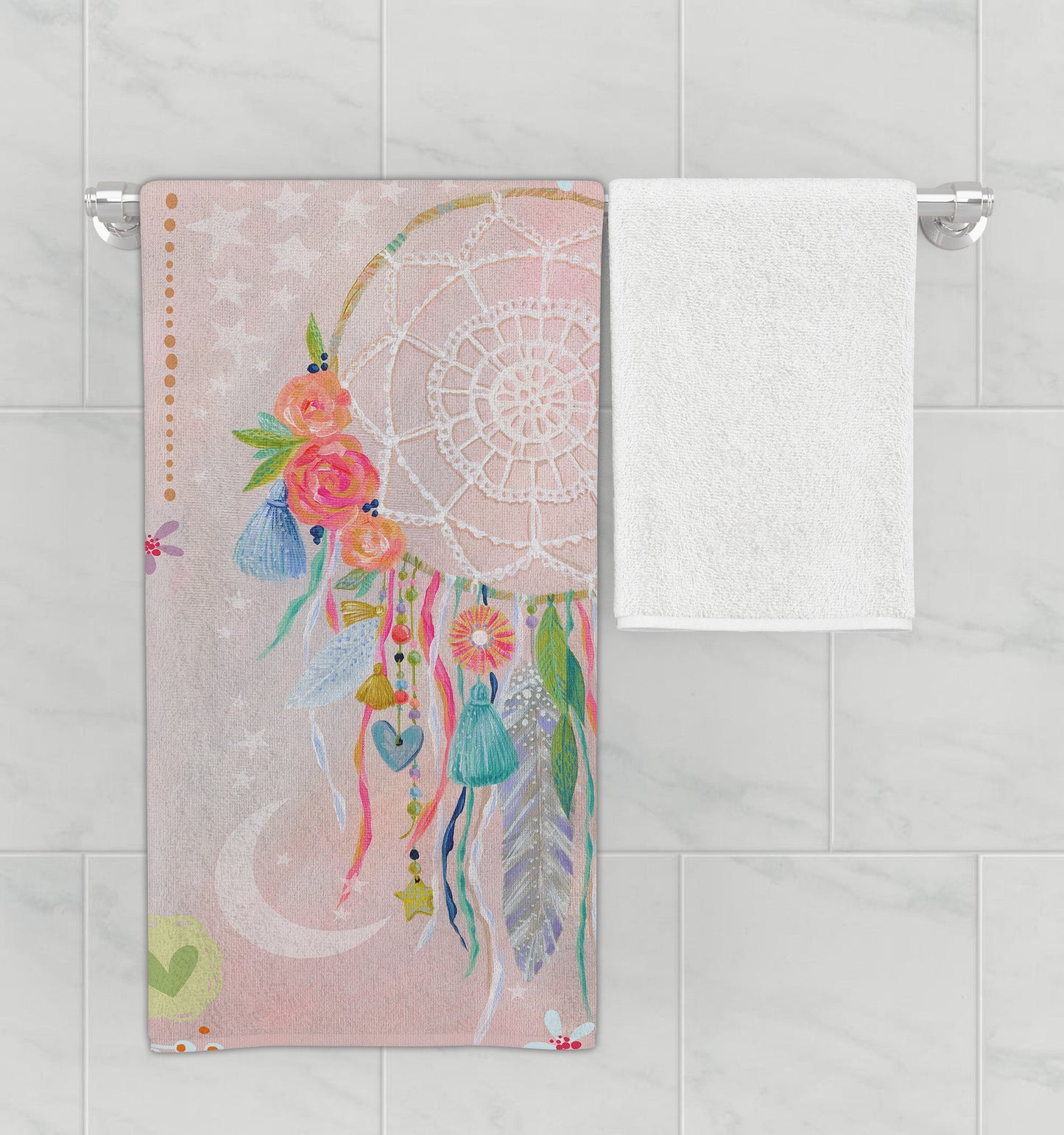 Bathroom rack with kid’s pink, dreamcatcher bath towel.