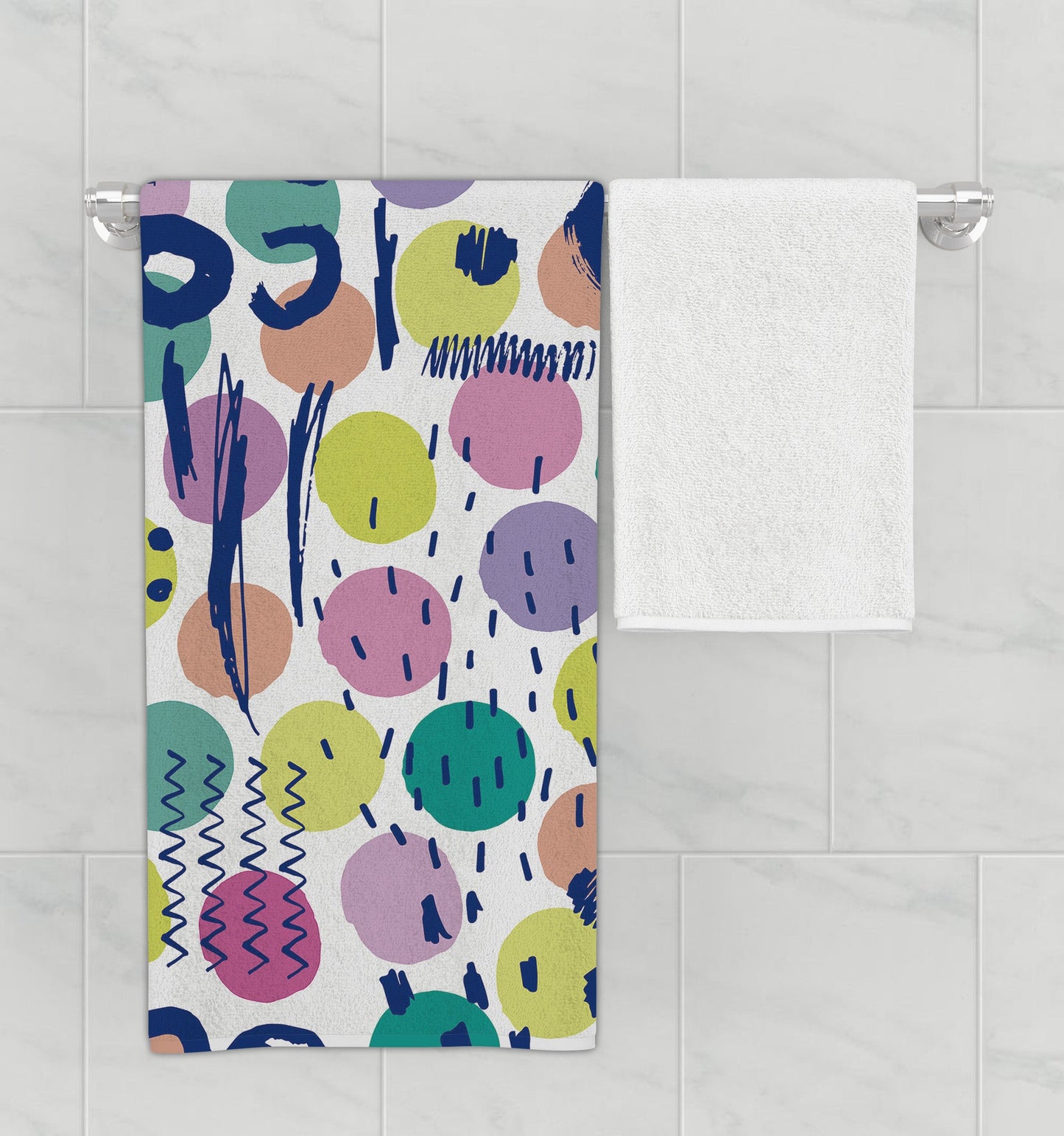 Bathroom rack featuring multicolored microfiber bath towel with fun doodle design.