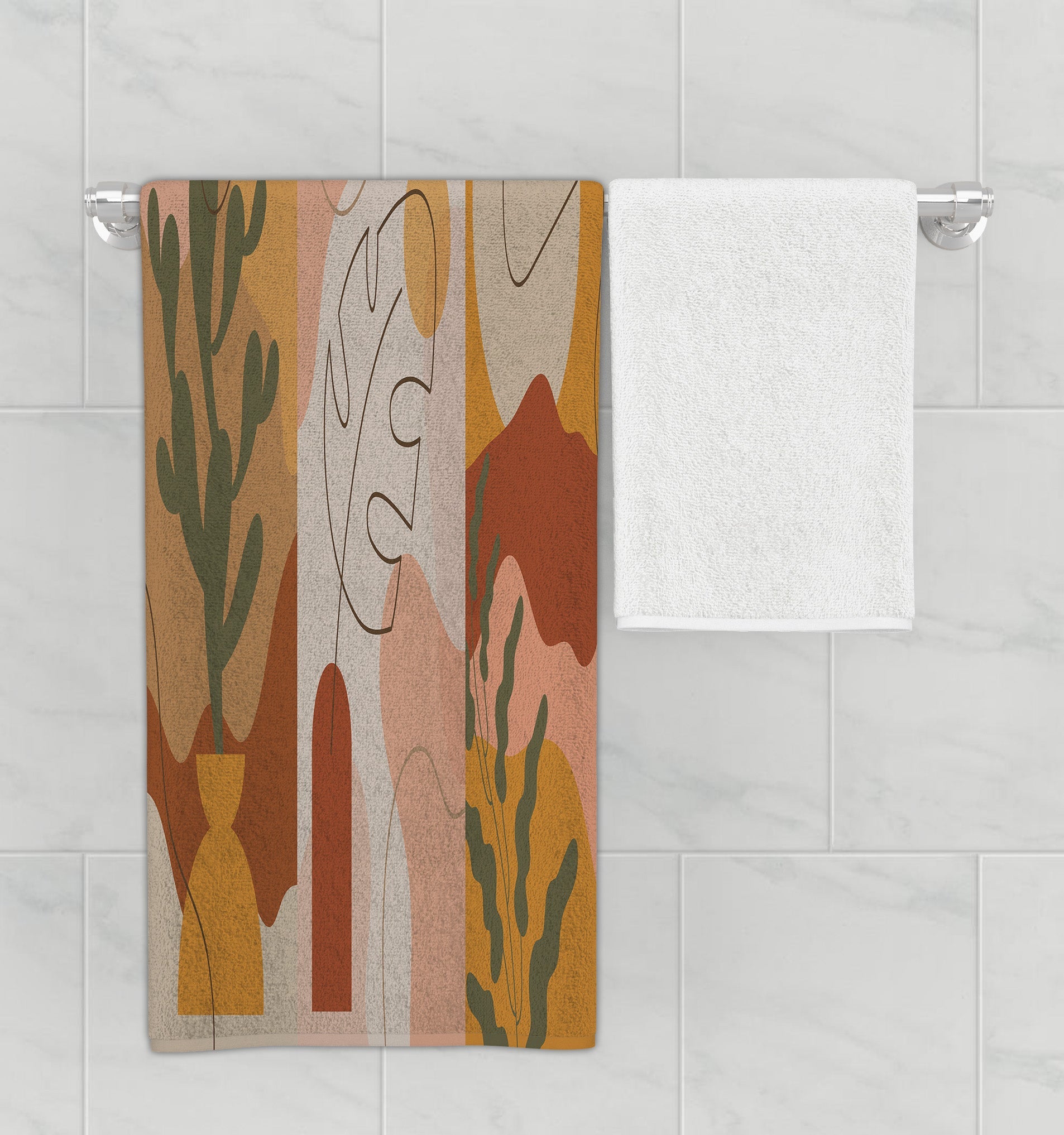 Printed microfiber bath towel on bathroom rack with multicolored bohemian desert design.