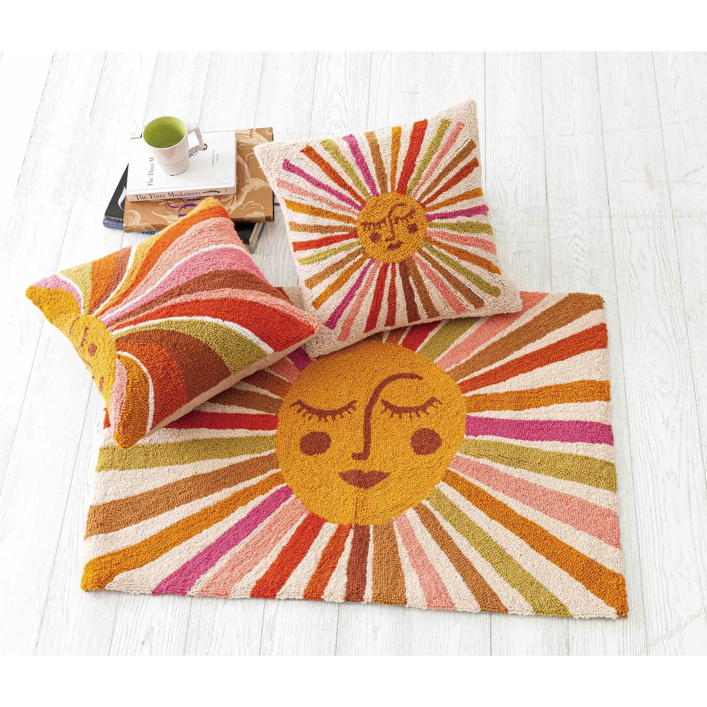 Cat Coq retro sun collection with accent rug and pillows.