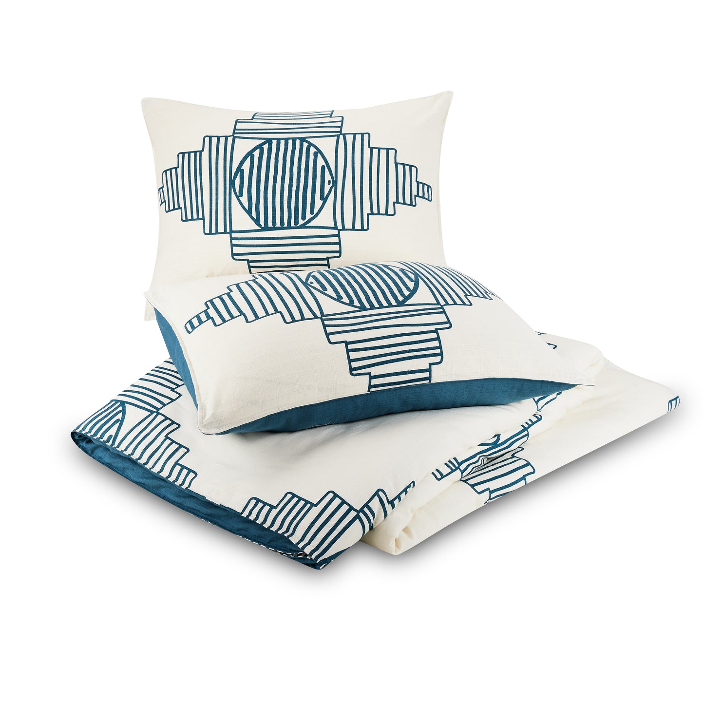 Two pillows on top of folded Justina Blakeney duvet cover with abstract turquoise and white pattern