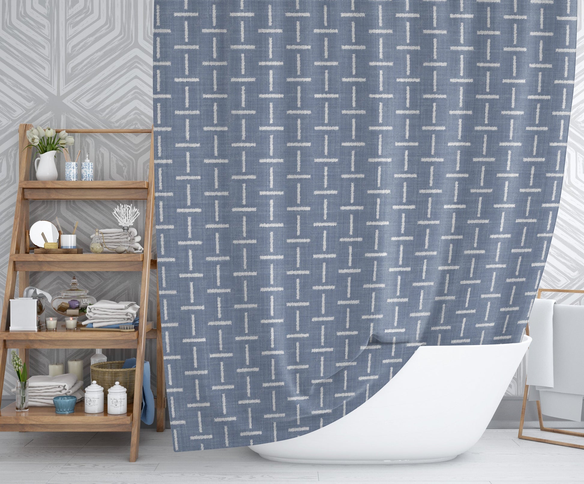 Modern bathroom highlighting printed chambray colored shower curtain with abstract cross design.