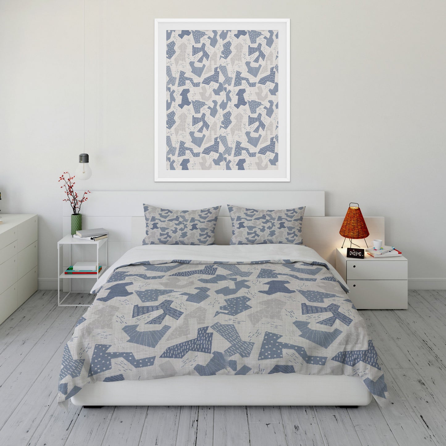 Fresh bedroom featuring plush gray Comforter Set with  crisp blue and white abstract shapes. 