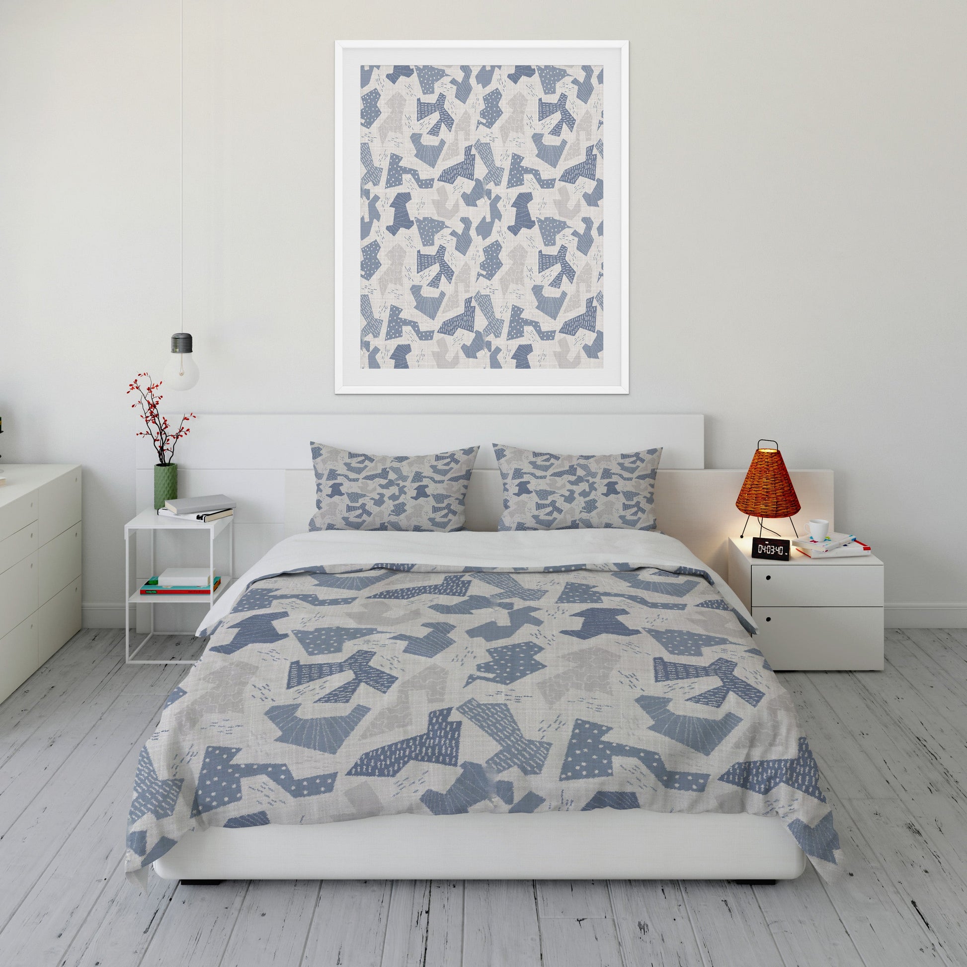 Fresh bedroom featuring plush gray Comforter Set with  crisp blue and white abstract shapes. 