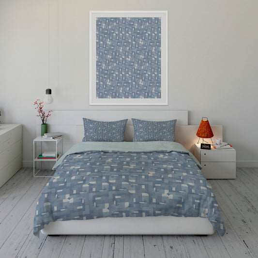 Refreshing bedroom featuring Sherpa Comforter Set with blue kaleidoscope printed design and matching wall art.