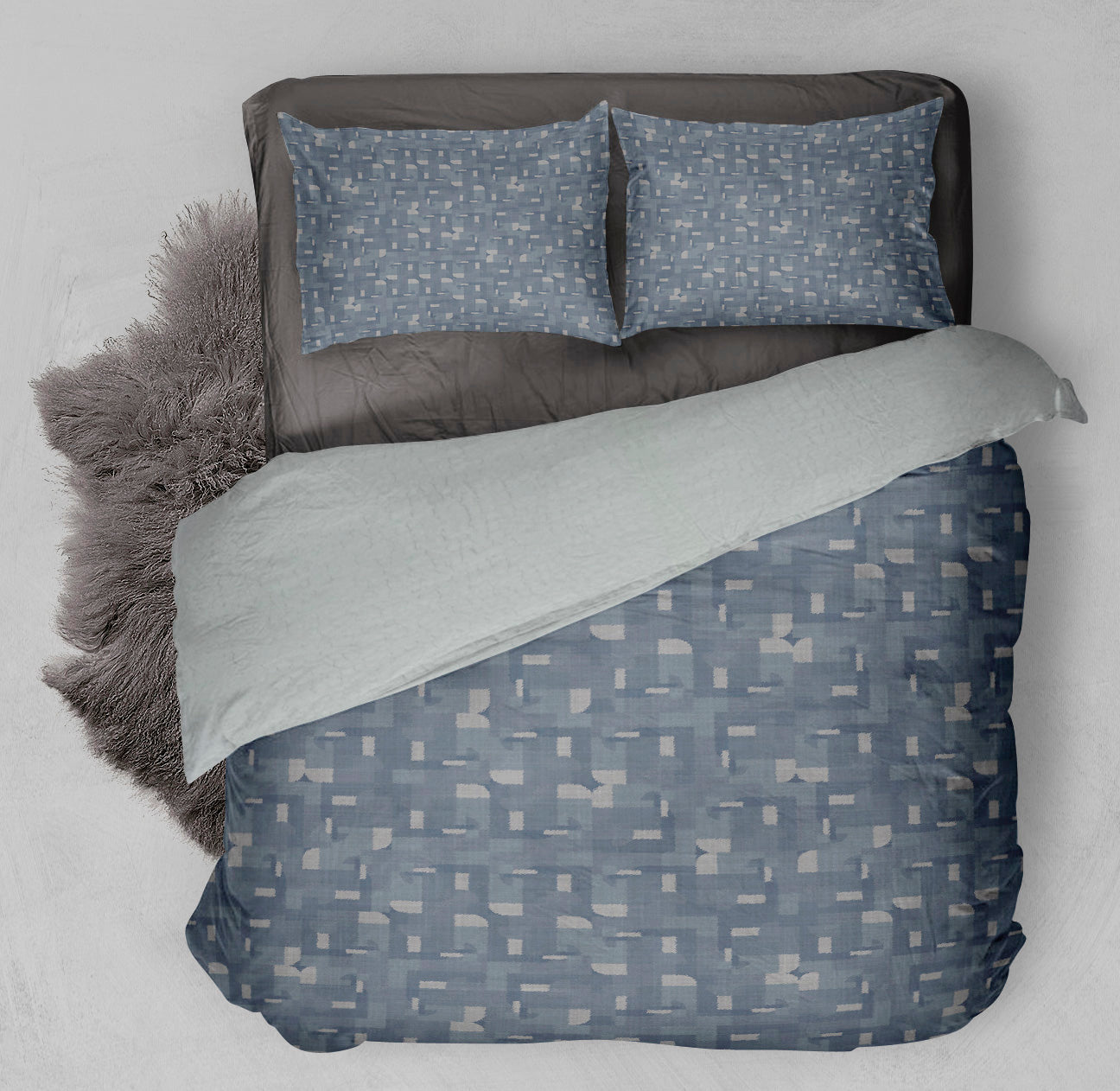 Bed with winter ready Sherpa Comforter Set displaying warm geometric design.