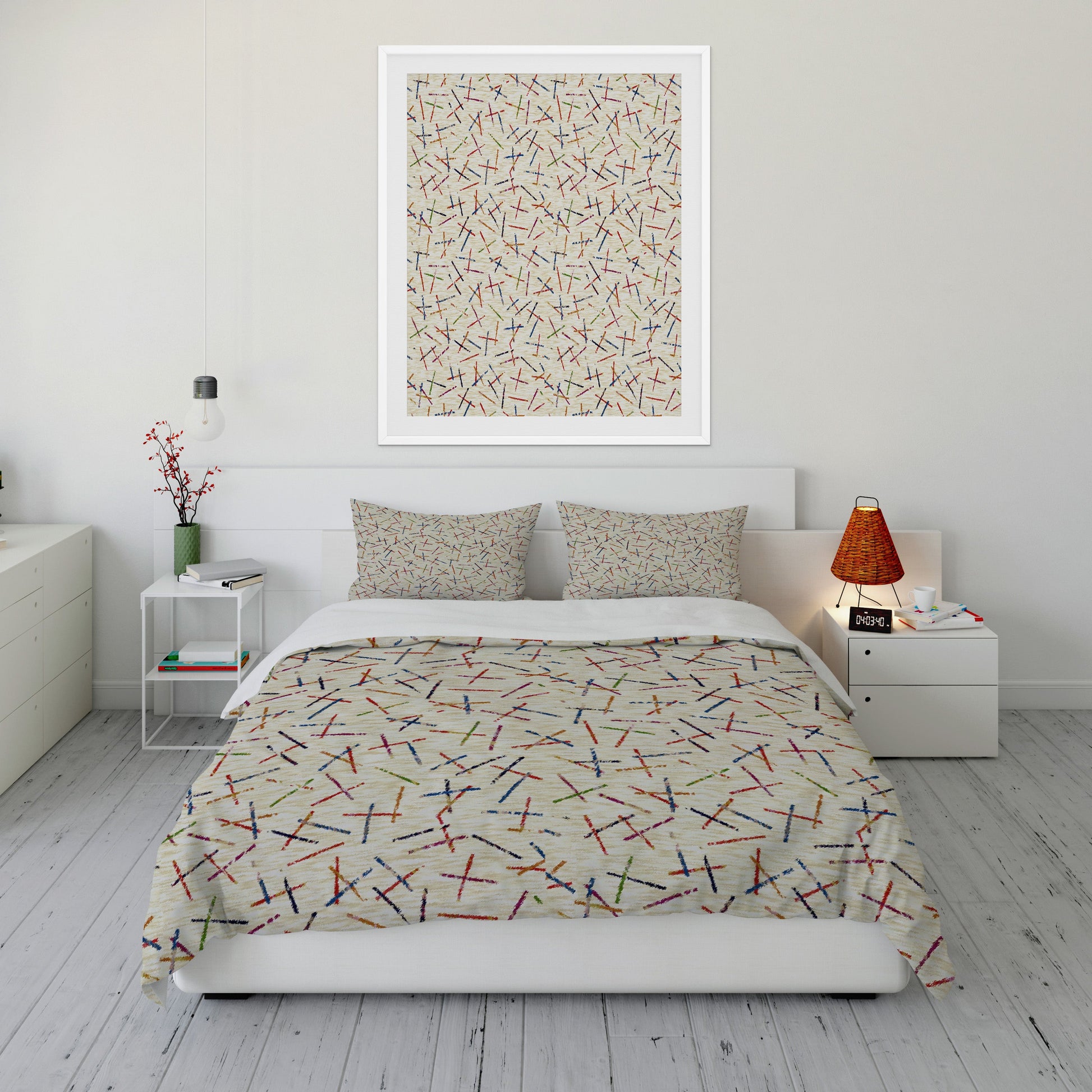 Cool toned bedroom featuring duvet cover set with colorful sticks pattern.