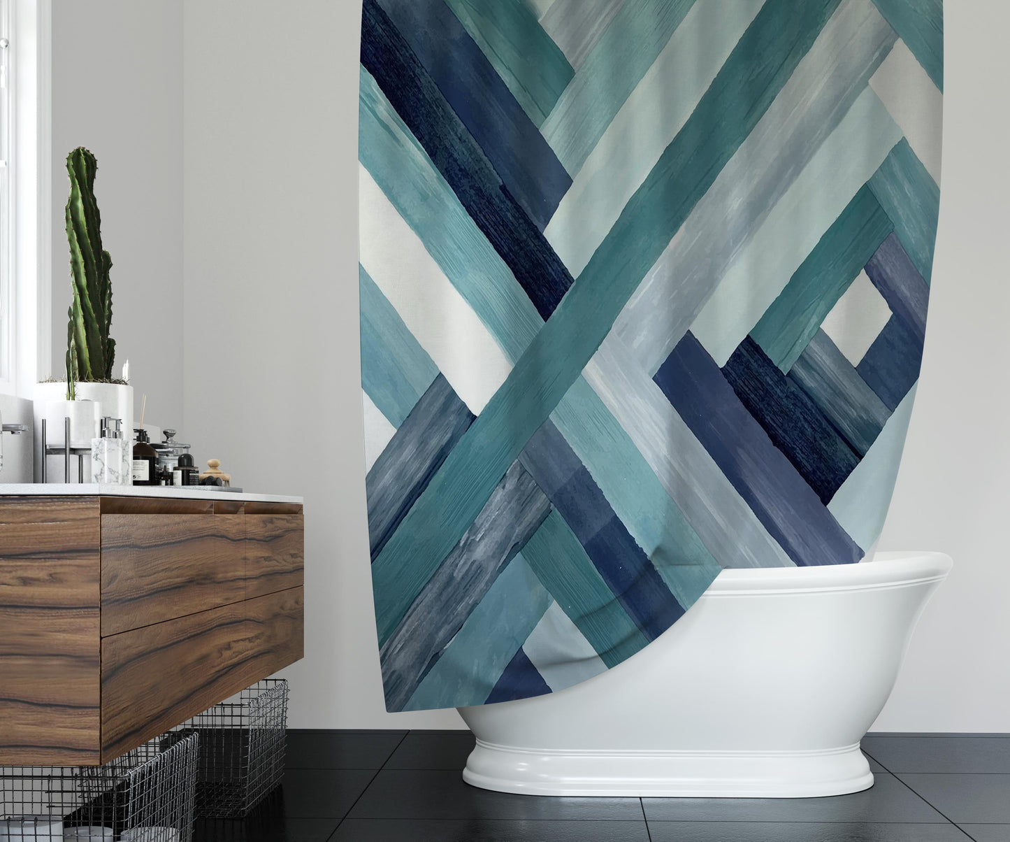 Modern bathroom featuring refreshing shower curtain, with brushstroke design, in various shades of blue.