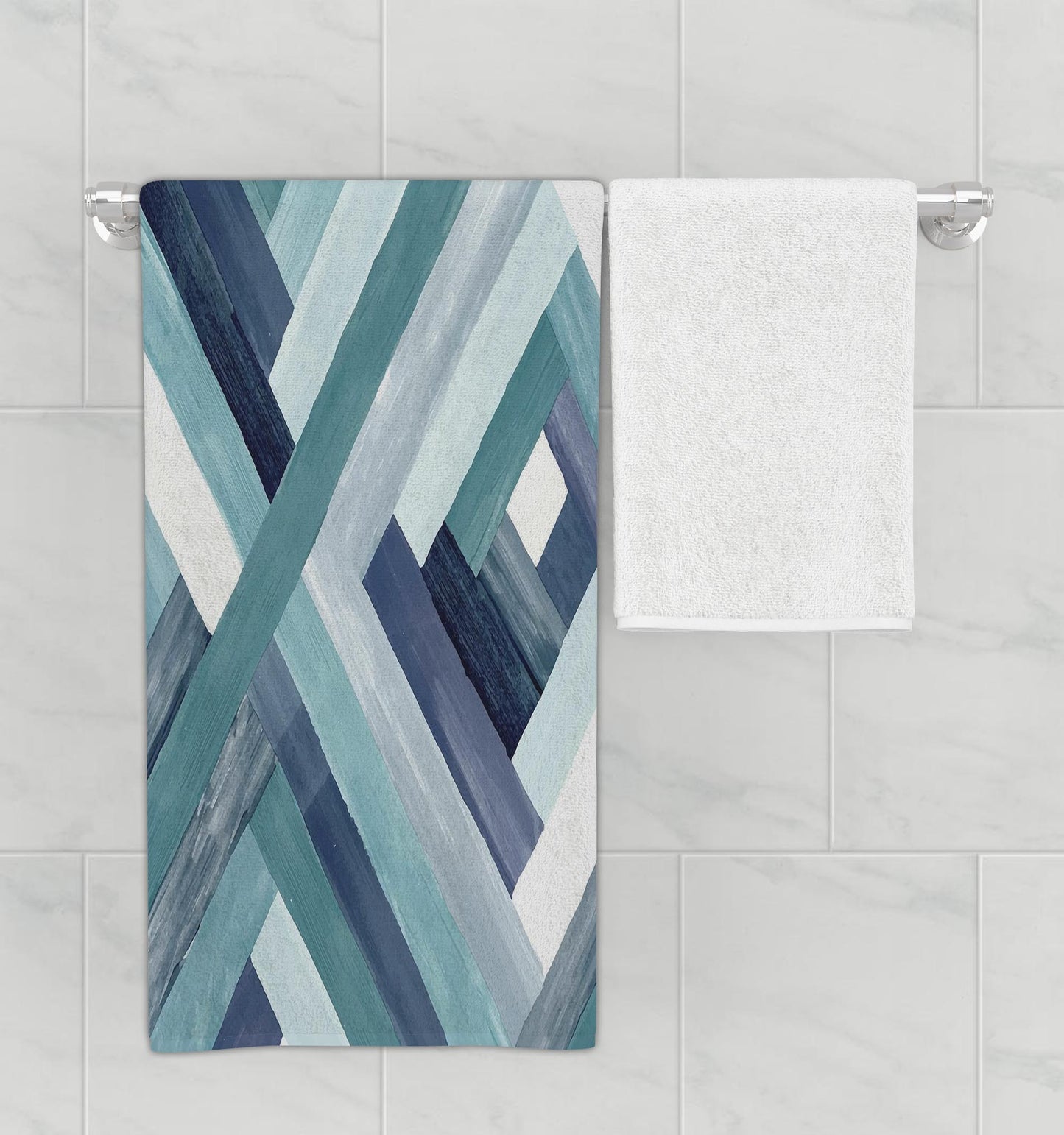 Bathroom rack displaying intriguing microfiber towel with blue intersecting brushstroke design.