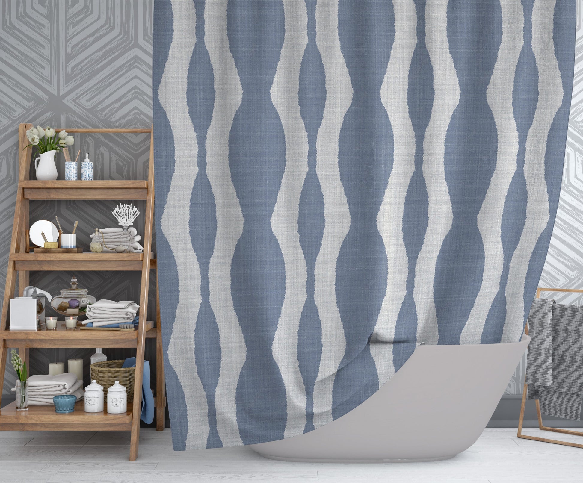 Modern bathroom highlighting washable shower curtain with chambray colored background with white wavy design throughout.