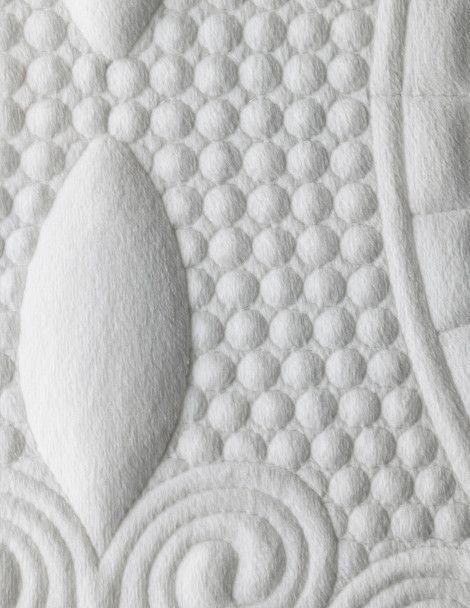 Detail view of white Luxus Anastasia Quilt with quality embroidery and classic style.