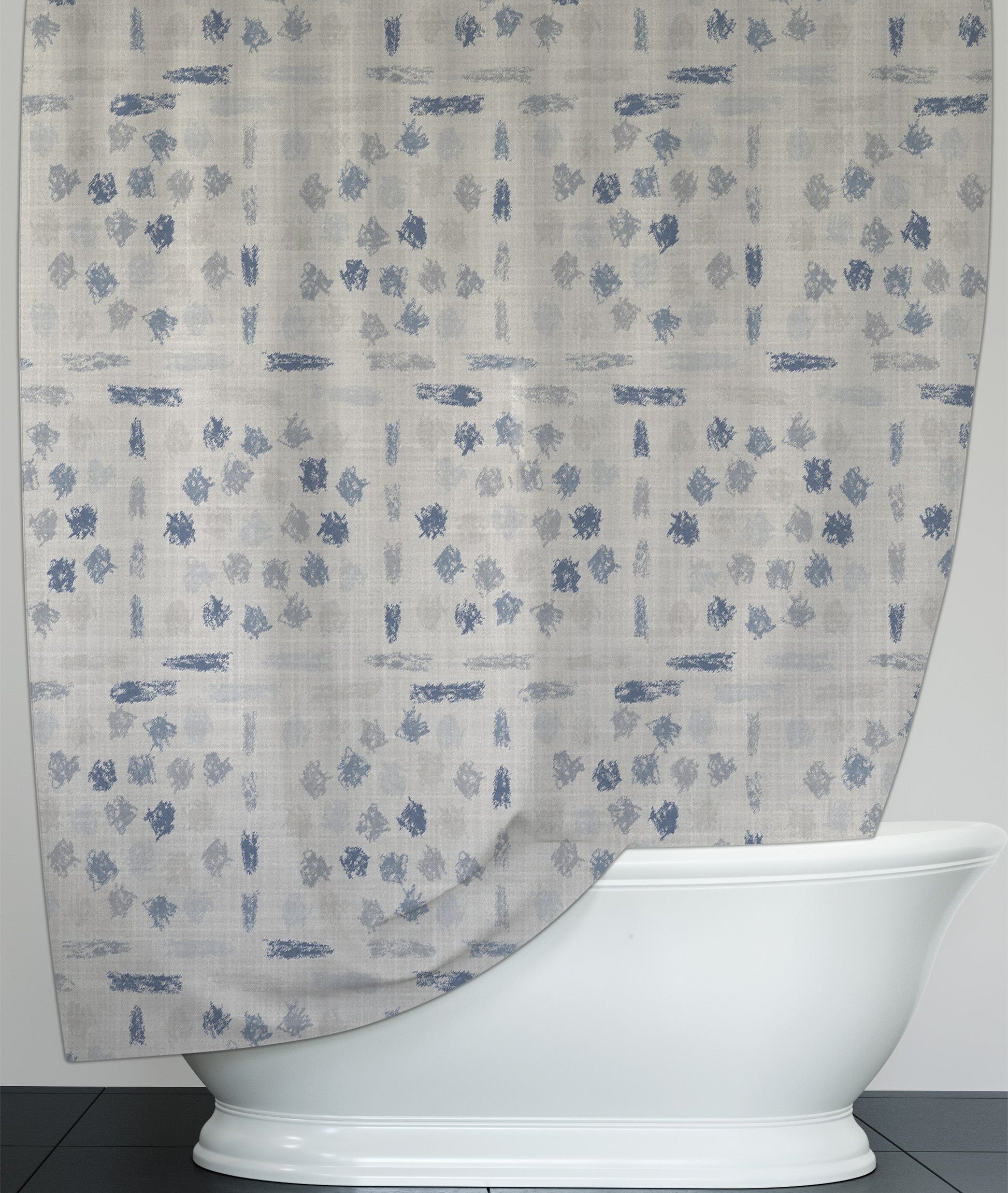 Hanging shower curtain with artsy printed blue and gray scribbles.