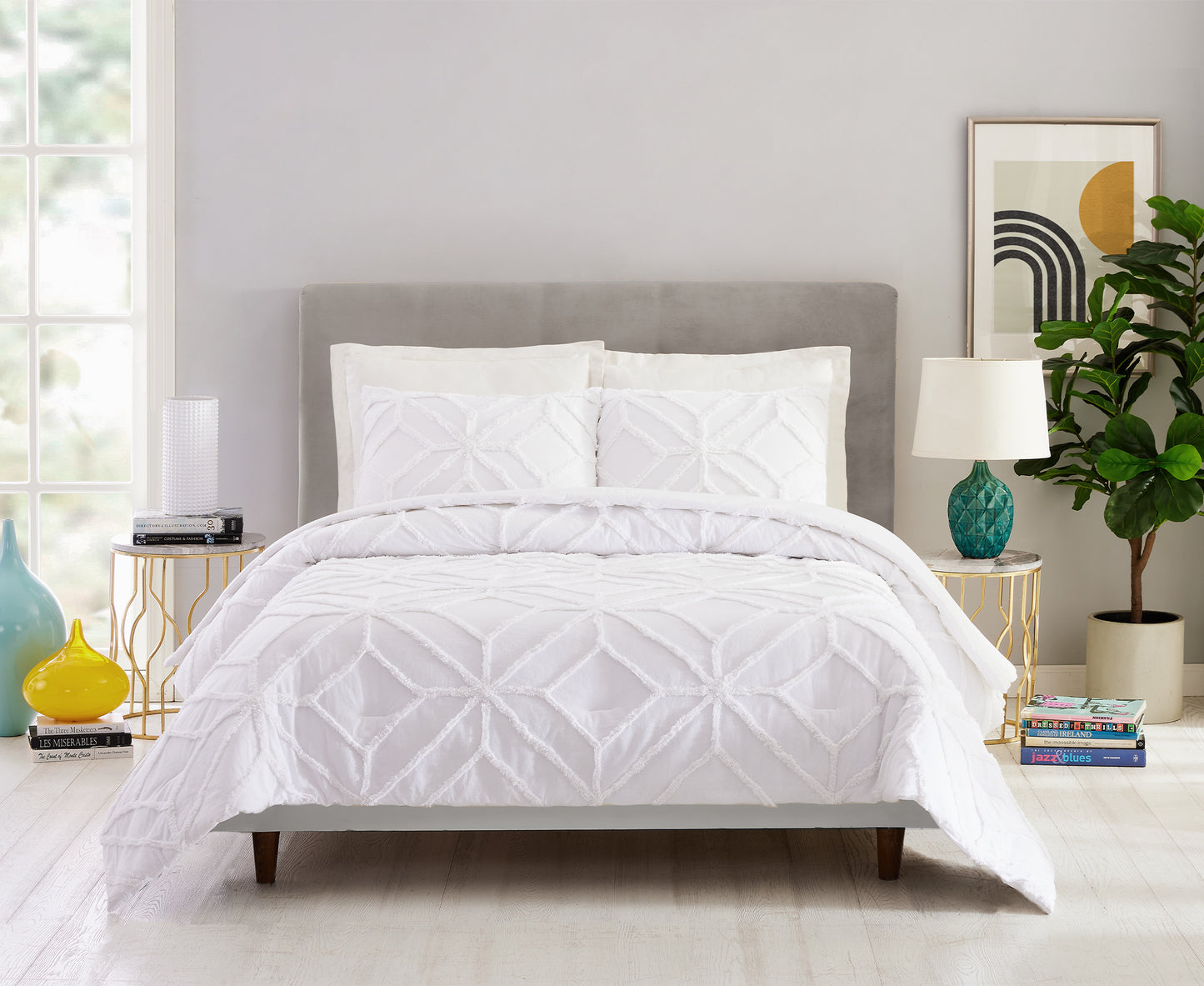 Bohemian style bedroom featuring white Trina Turk Trellis Duvet Set.