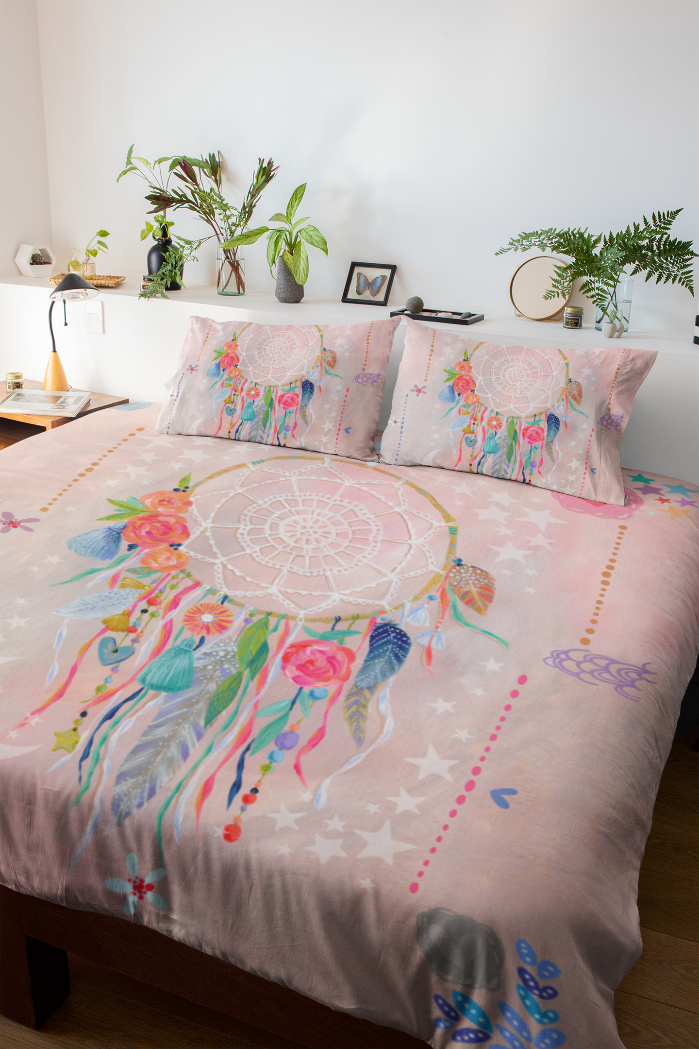 Bedroom featuring pink duvet cover set with dreamcatcher print.