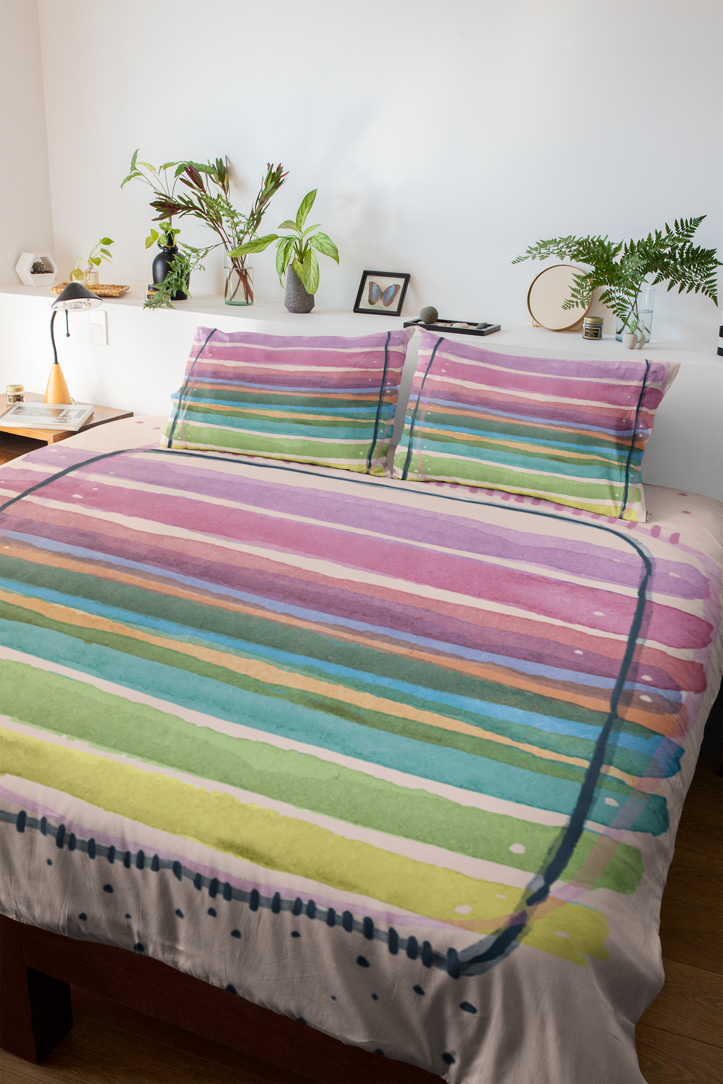 Relaxed bedroom featuring duvet cover set with watercolor pastel brushstrokes design.