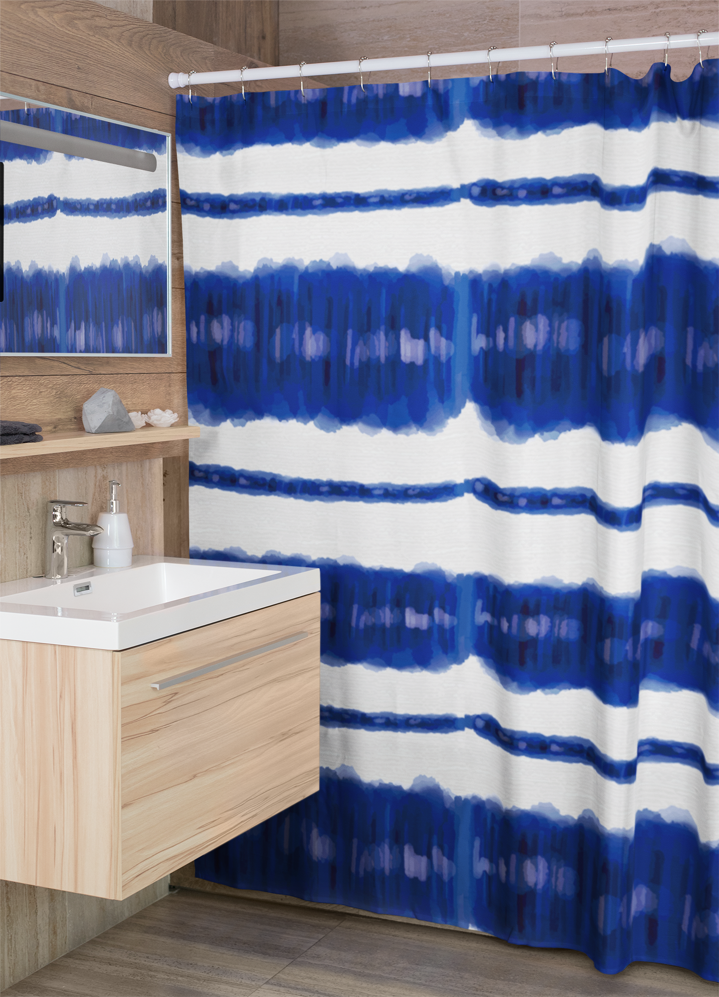 Modern bathroom with printed shower curtain featuring bright blue and white nautical design.