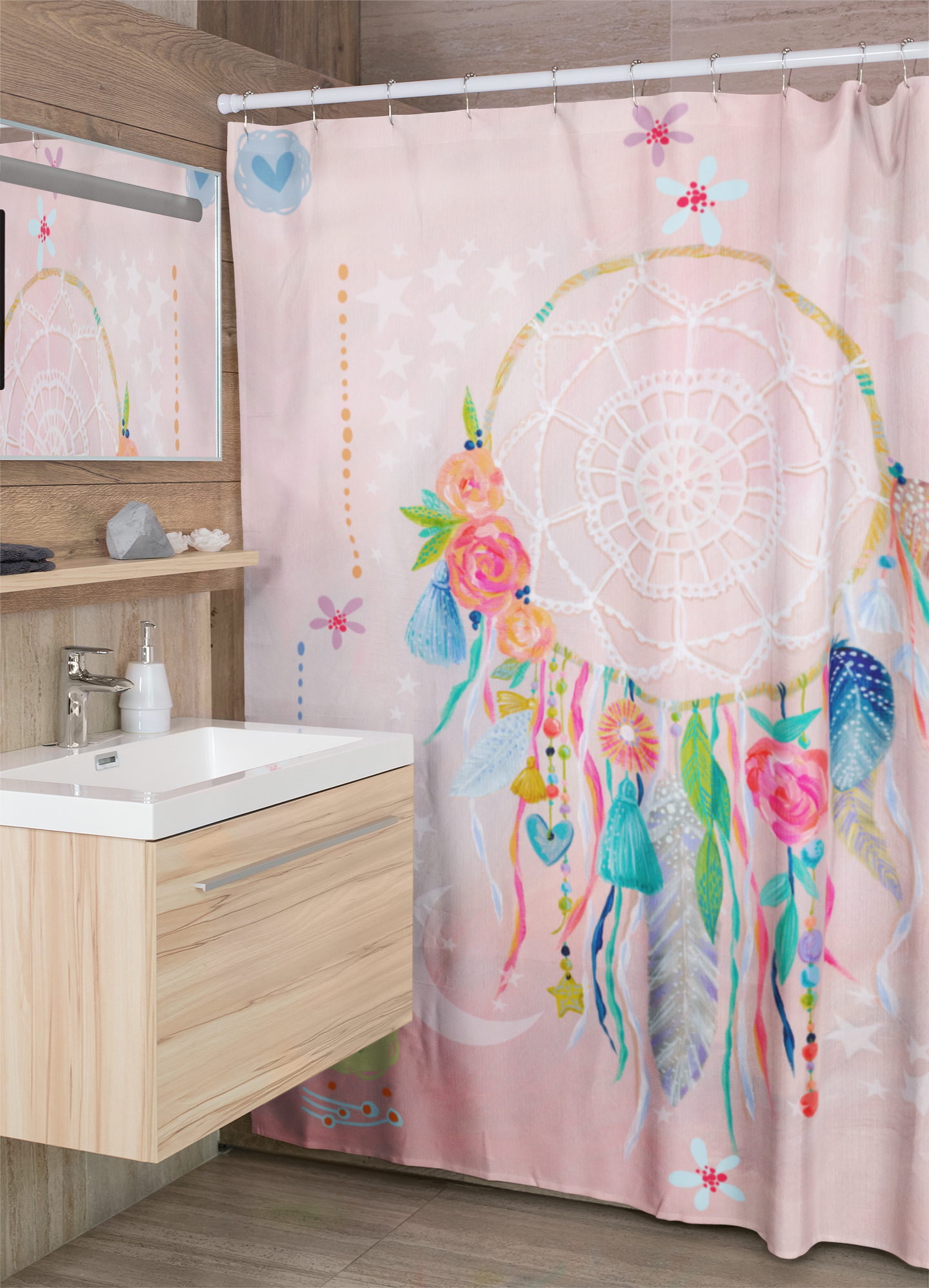 Washable kid’s shower curtain with pink dreamcatcher design. 